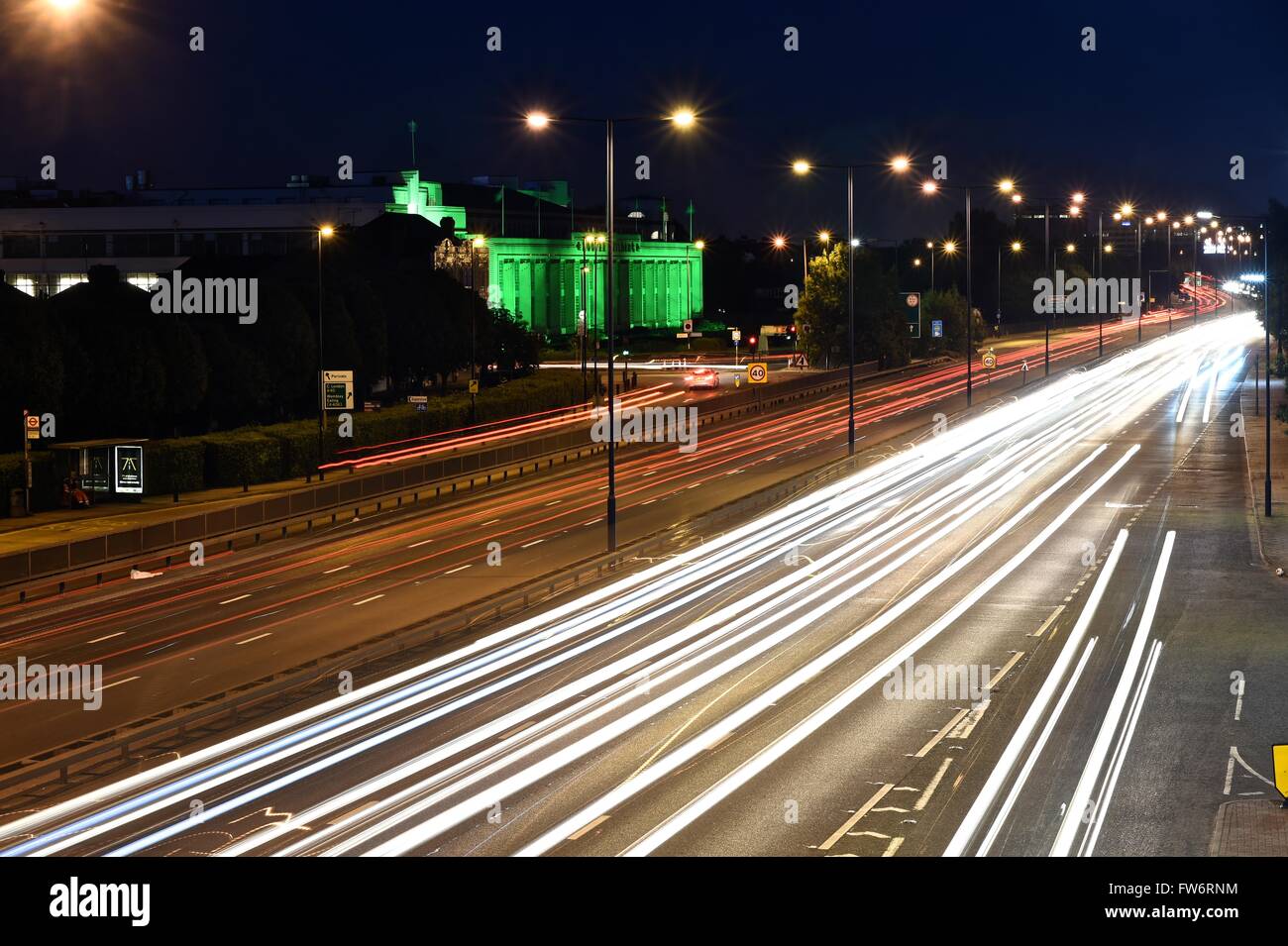 Light trails on busy London road includes The Hoover building Stock Photo