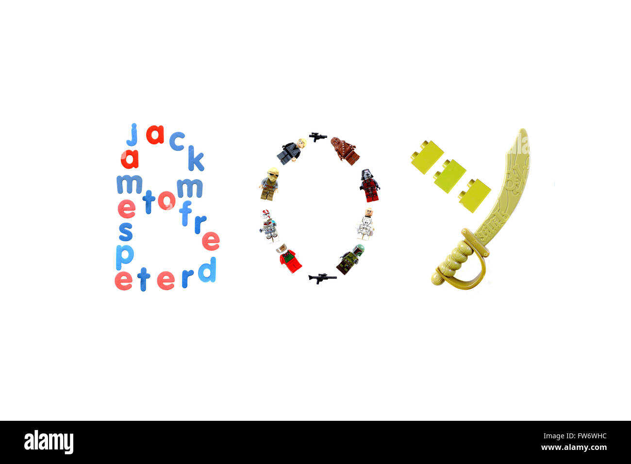 The word BOY created from child's toys photographed against a white