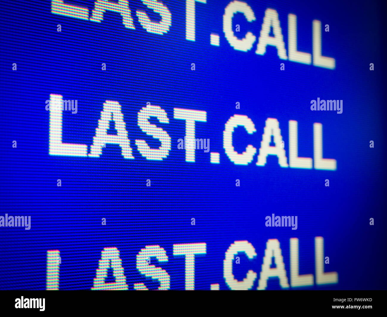 Close-up of electronic annunciator panel at an airport showing 'Last Call' for boarding Stock Photo
