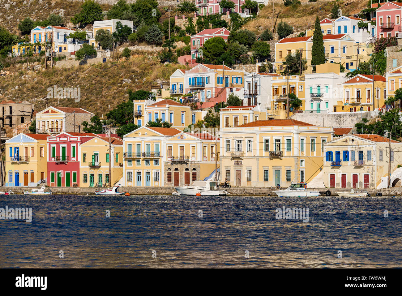 Colorful houses in port of Symi island Greece Stock Photo Alamy