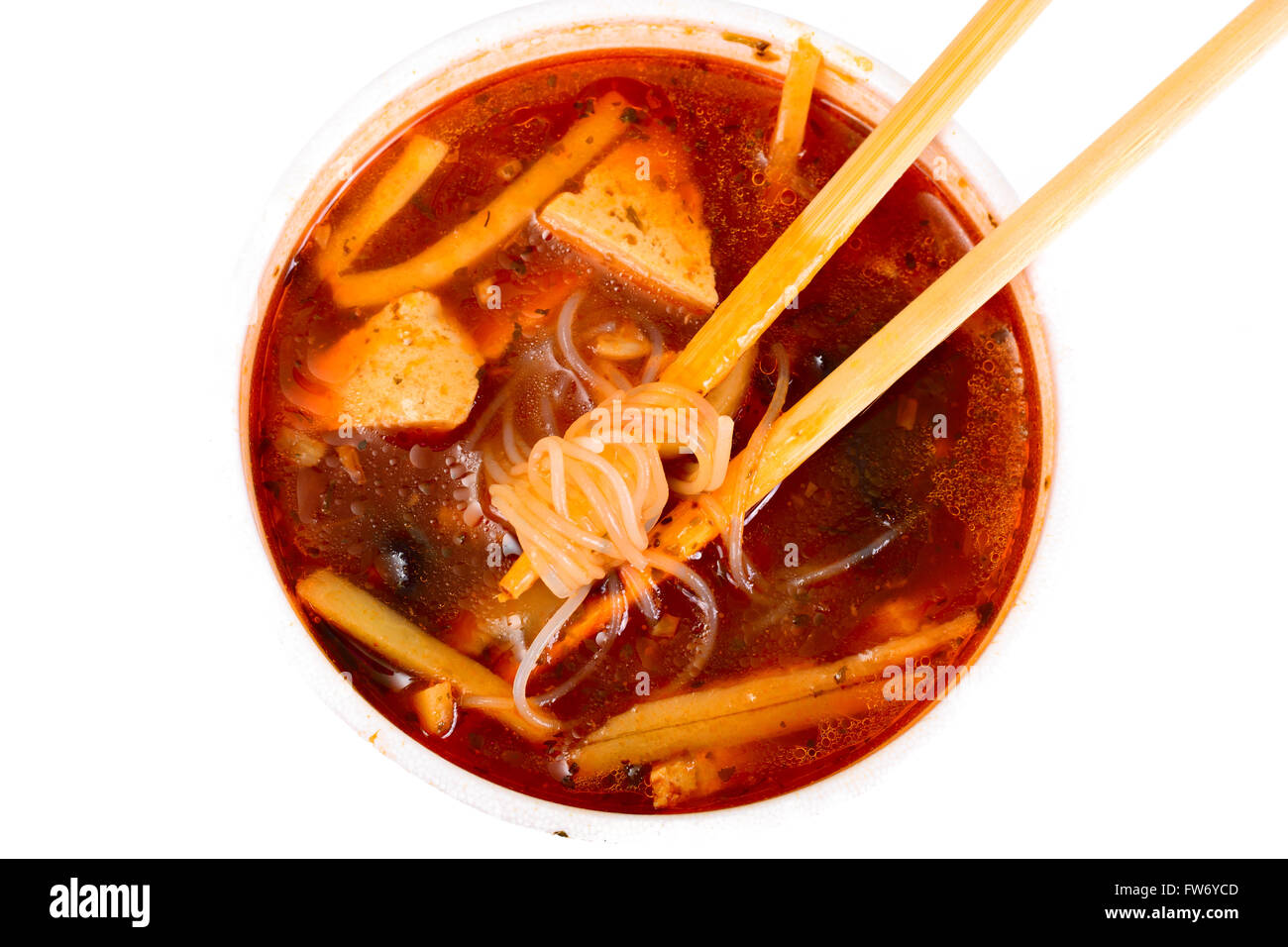 WOK soup rice noodles, tofu, tomato base Stock Photo Alamy