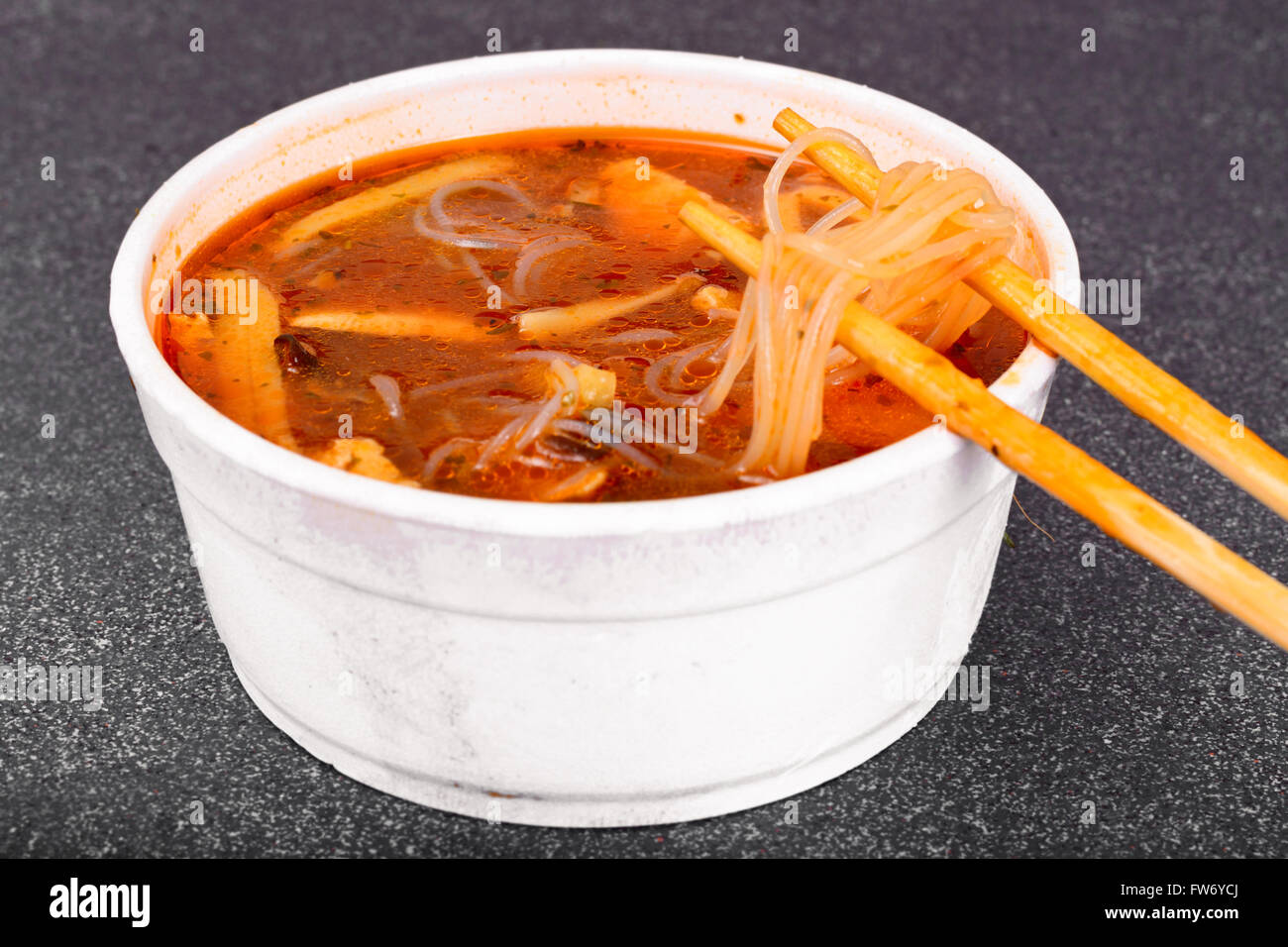 WOK soup rice noodles, tofu, tomato base Stock Photo Alamy