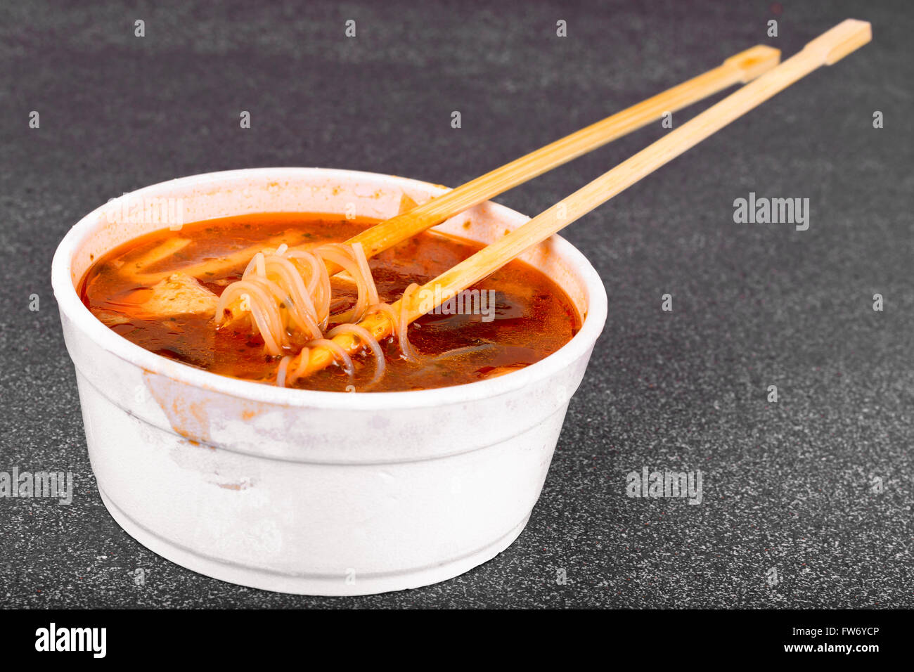 WOK soup rice noodles, tofu, tomato base Stock Photo Alamy
