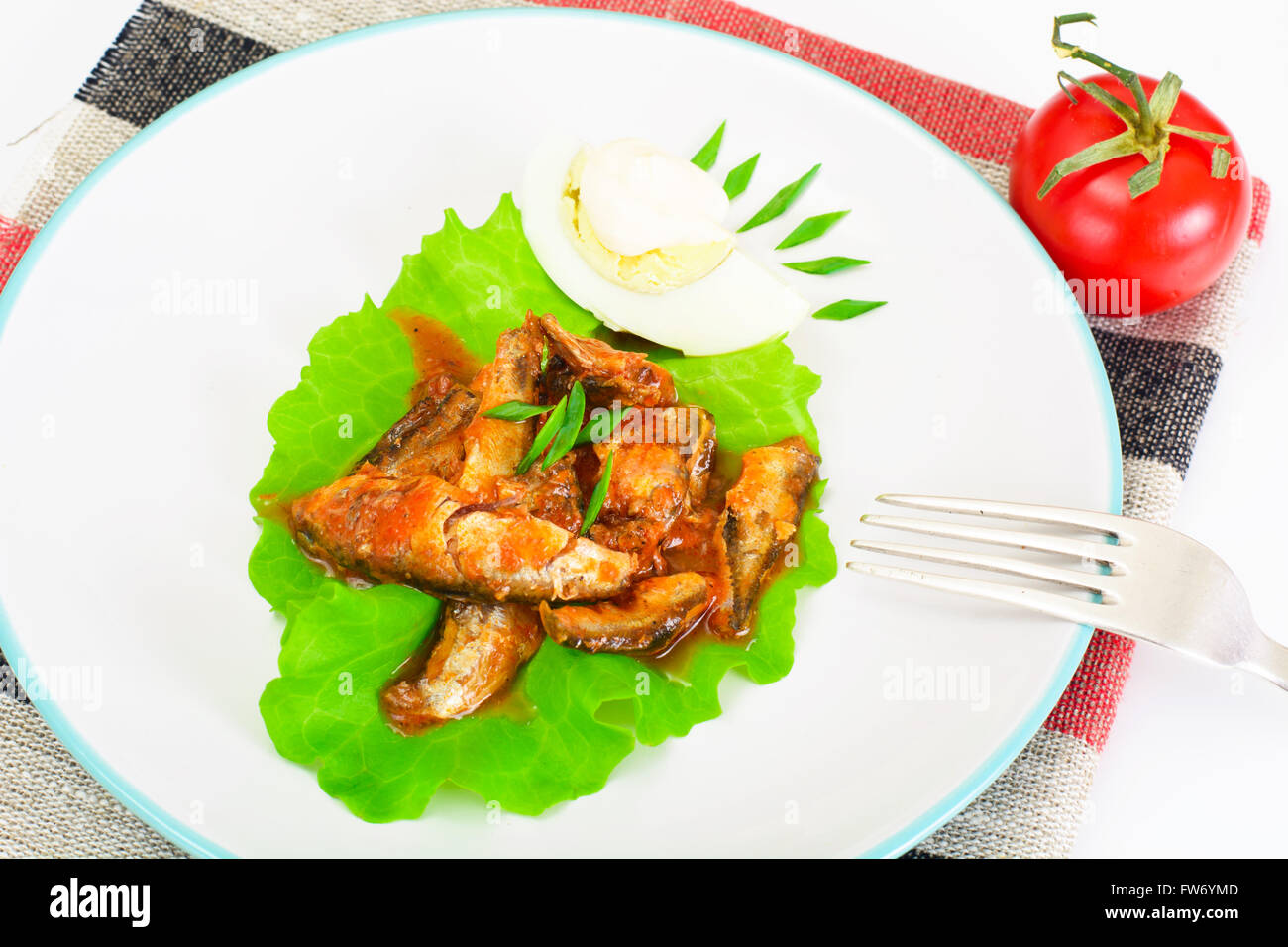 Canned Fish with Eggs on Lettuce Stock Photo Alamy