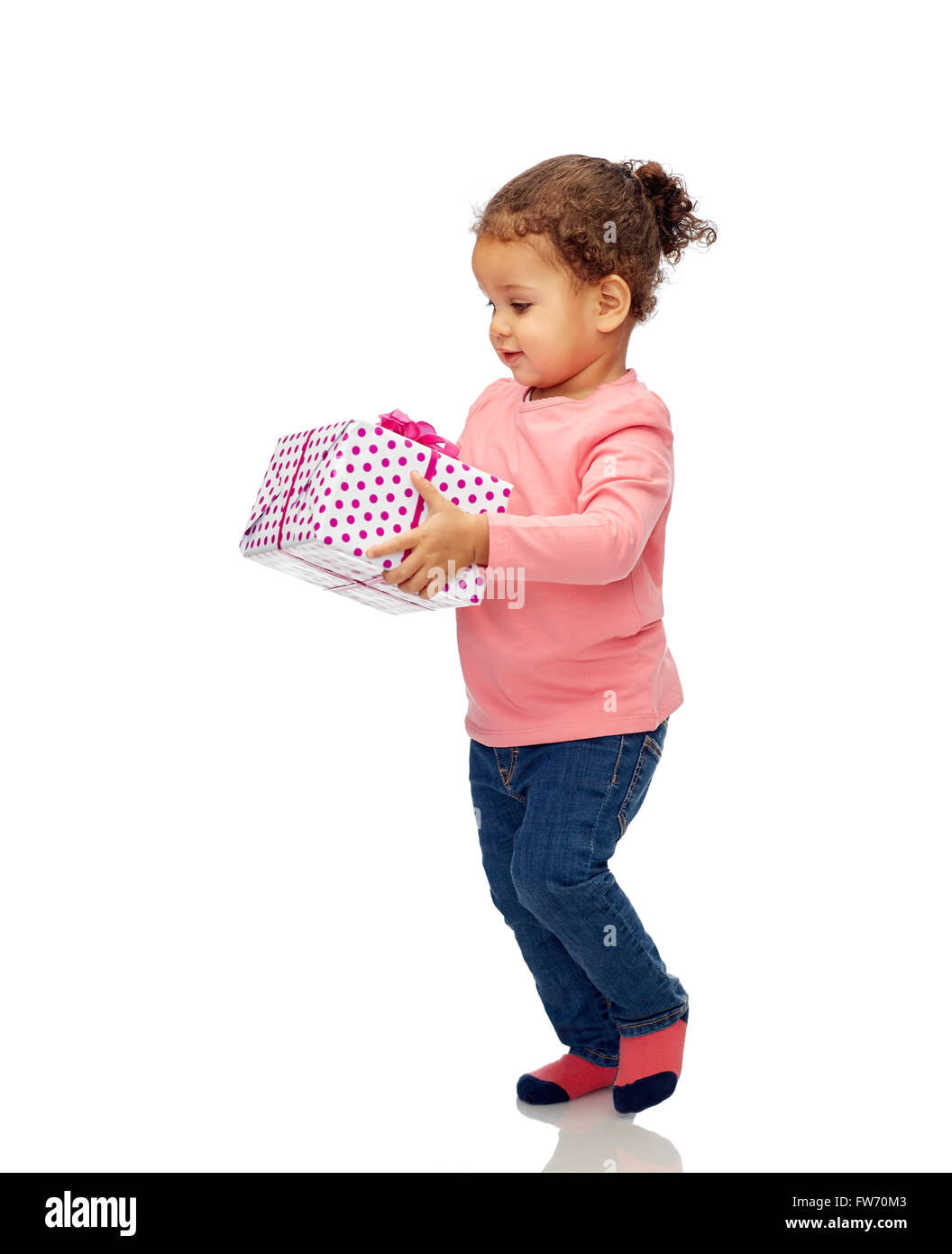 beautiful little baby girl with birthday present Stock Photo - Alamy