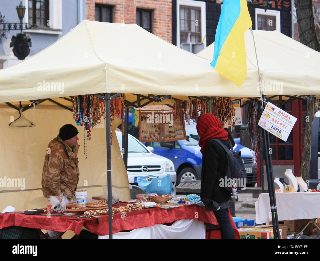 KAUNAS, LITHUANIA - MARCH 20: Unidentified buyer and seller during traditional Spring craft Kaziuko fair Stock Photo