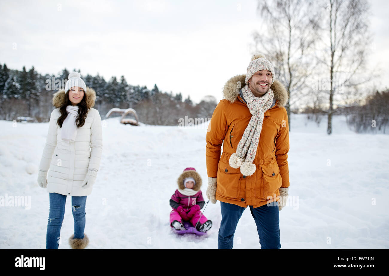 happy family with sled walking in winter outdoors Stock Photo - Alamy