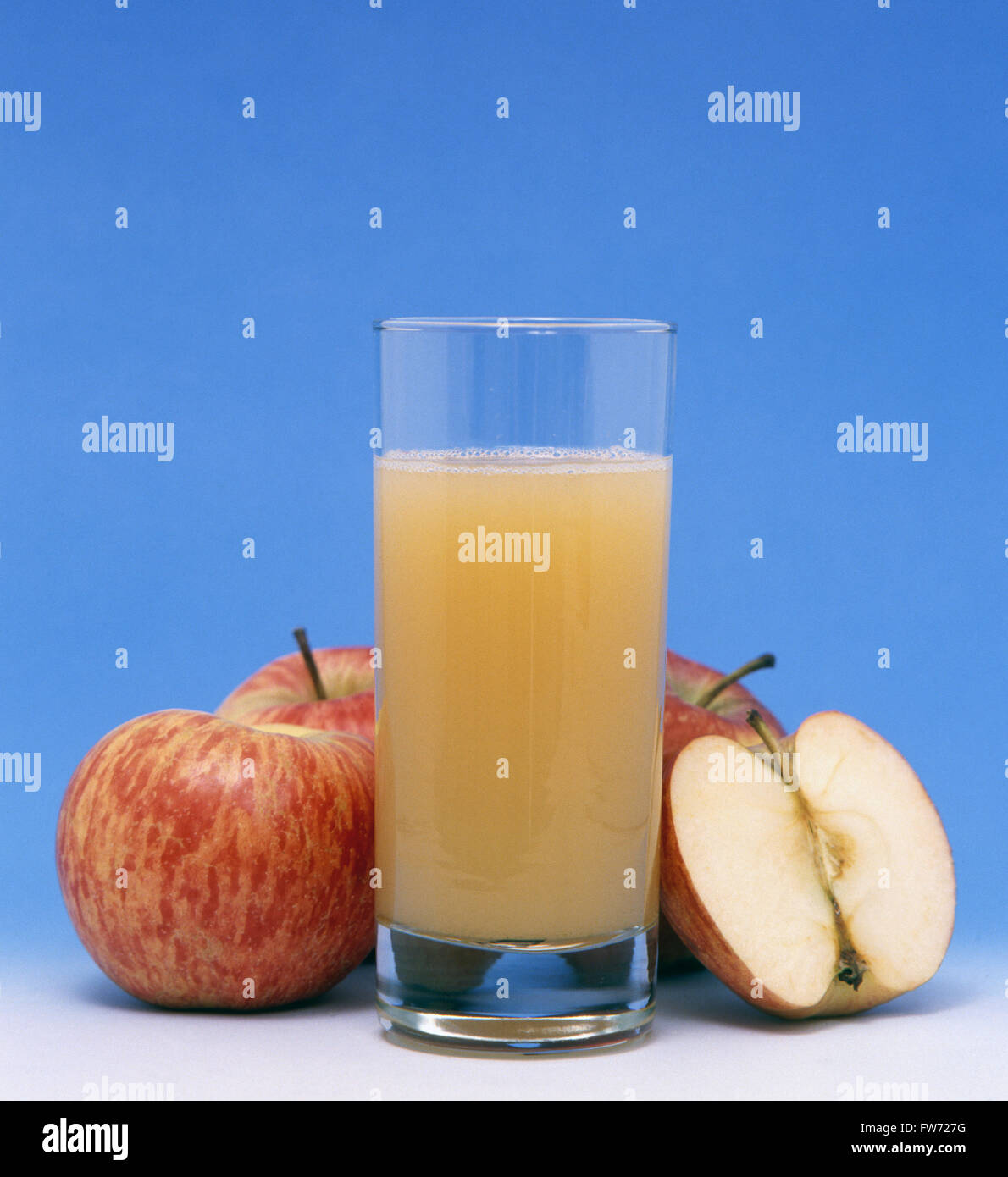 Freshly squeezed apple juice and fruit Stock Photo