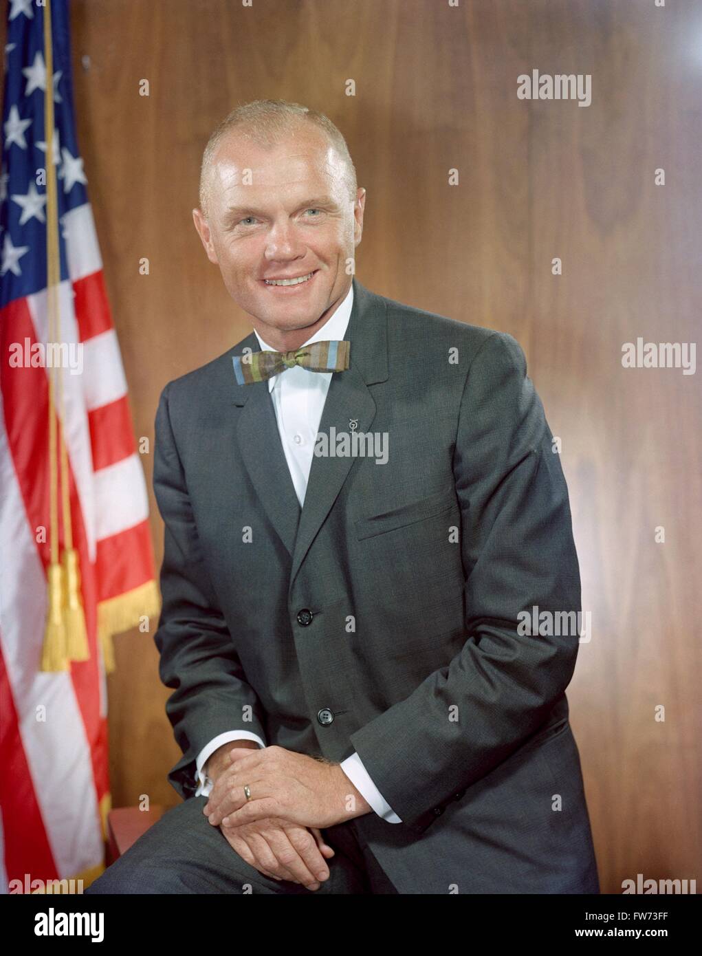 NASA Astronaut John Glenn portrait in suit and tie at the Johnson Space Center October 30, 1964 in Houston, Texas. Glenn became the first American to fly a manned orbital space flight aboard the craft. Stock Photo