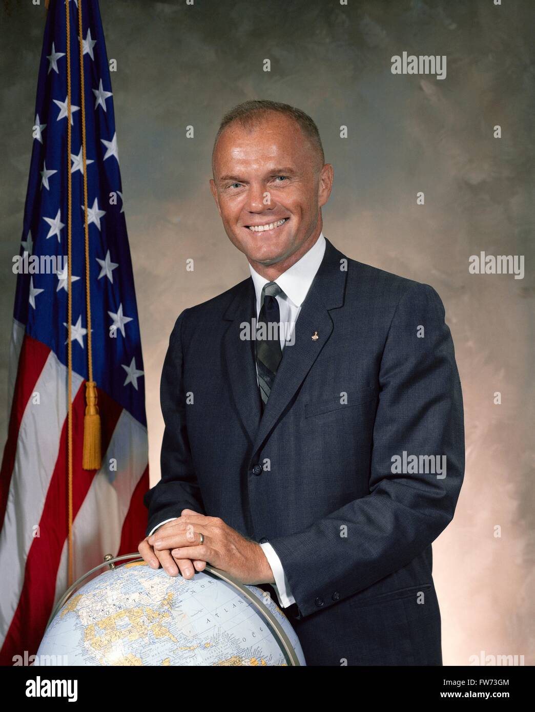 NASA Astronaut John Glenn portrait in suit and tie at the Johnson Space Center October 30, 1964 in Houston, Texas. Glenn became the first American to fly a manned orbital space flight aboard the craft. Stock Photo