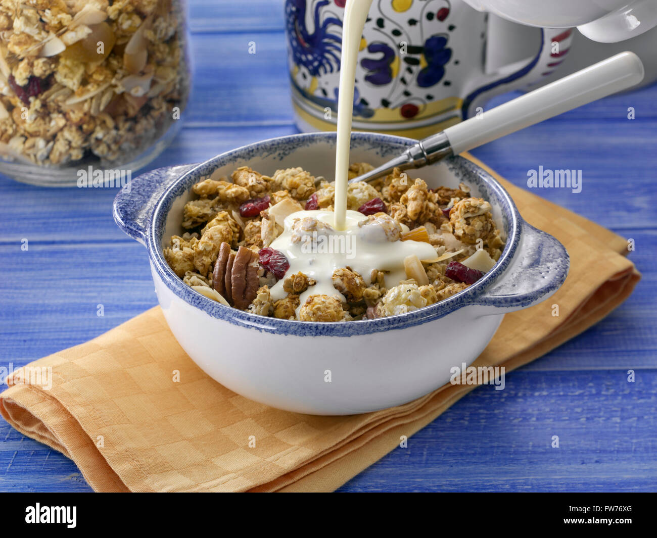 Jug of milk and cereal pouring hi-res stock photography and ...