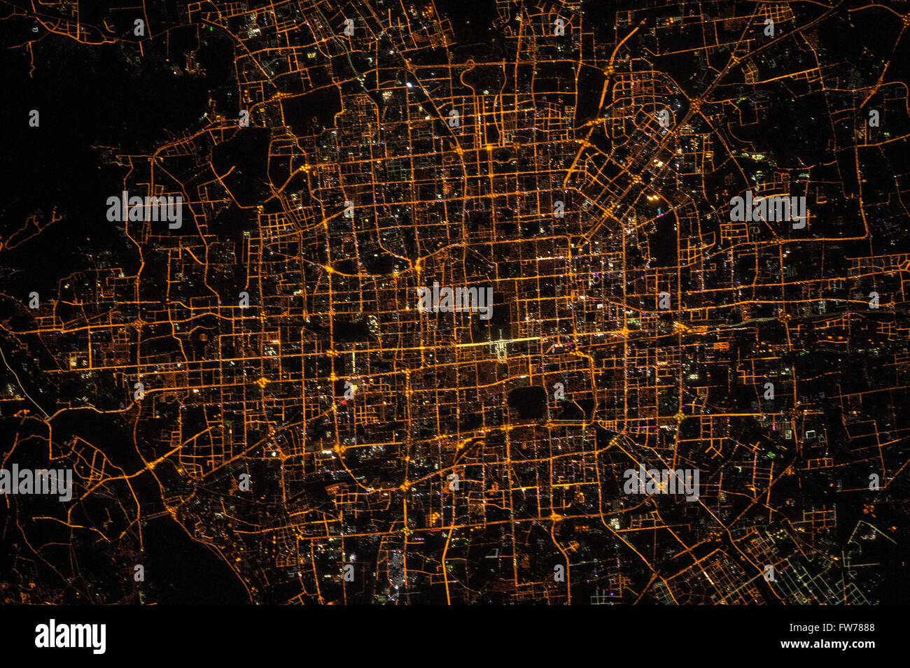 International Space Station view looking down the lights of Beijing China at night from space March 20, 2016 in Earth Orbit. Stock Photo