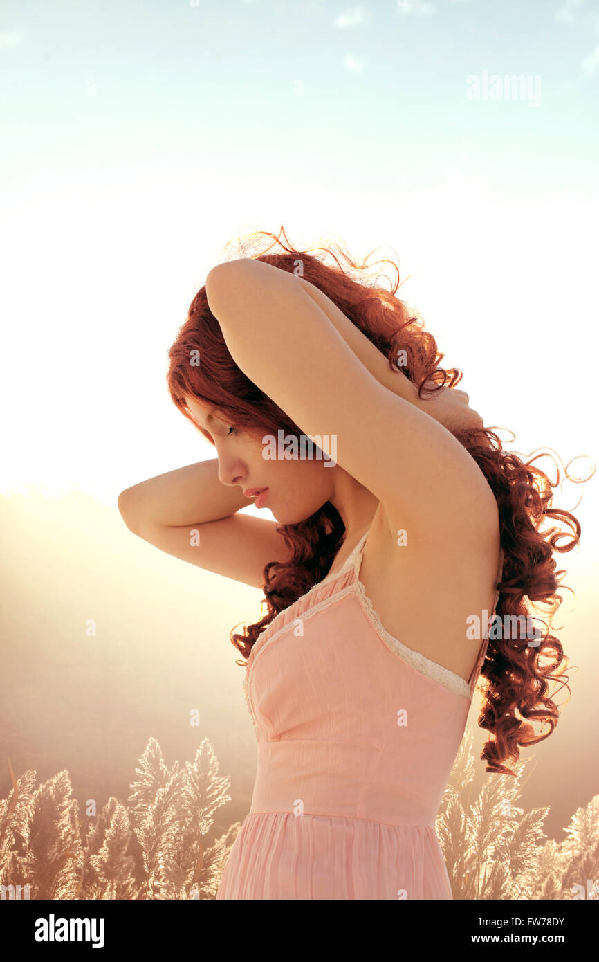 Curly woman in profile Stock Photo