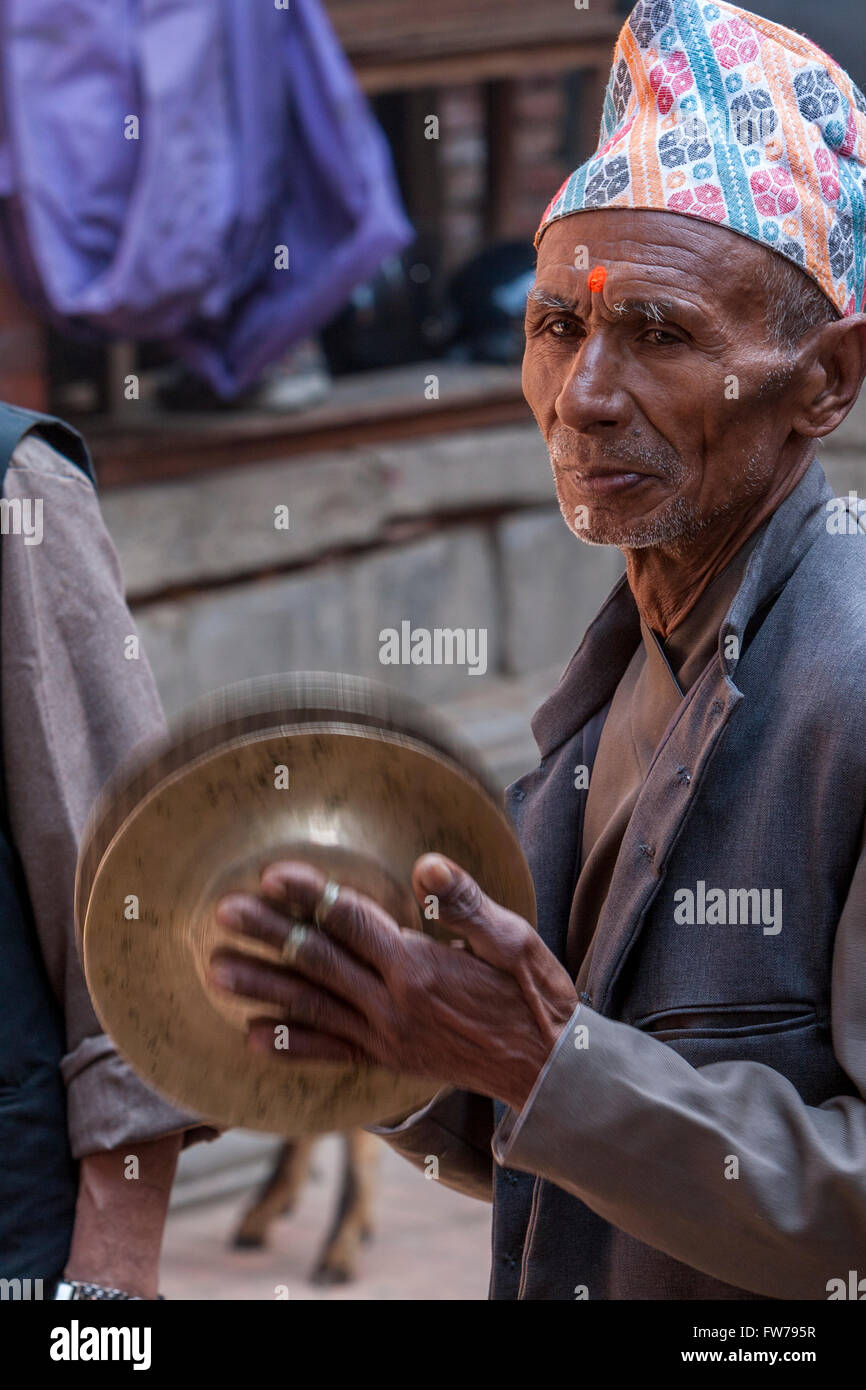 Bhaktapur, Nepal.  Newari Musician Playing the Cymbals. Stock Photo