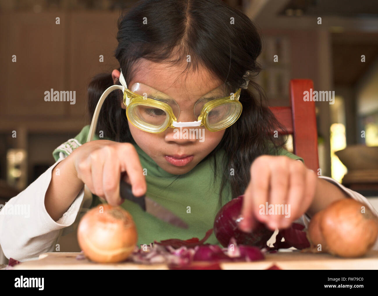 Onion peeling technique with diving glasses Stock Photo Alamy