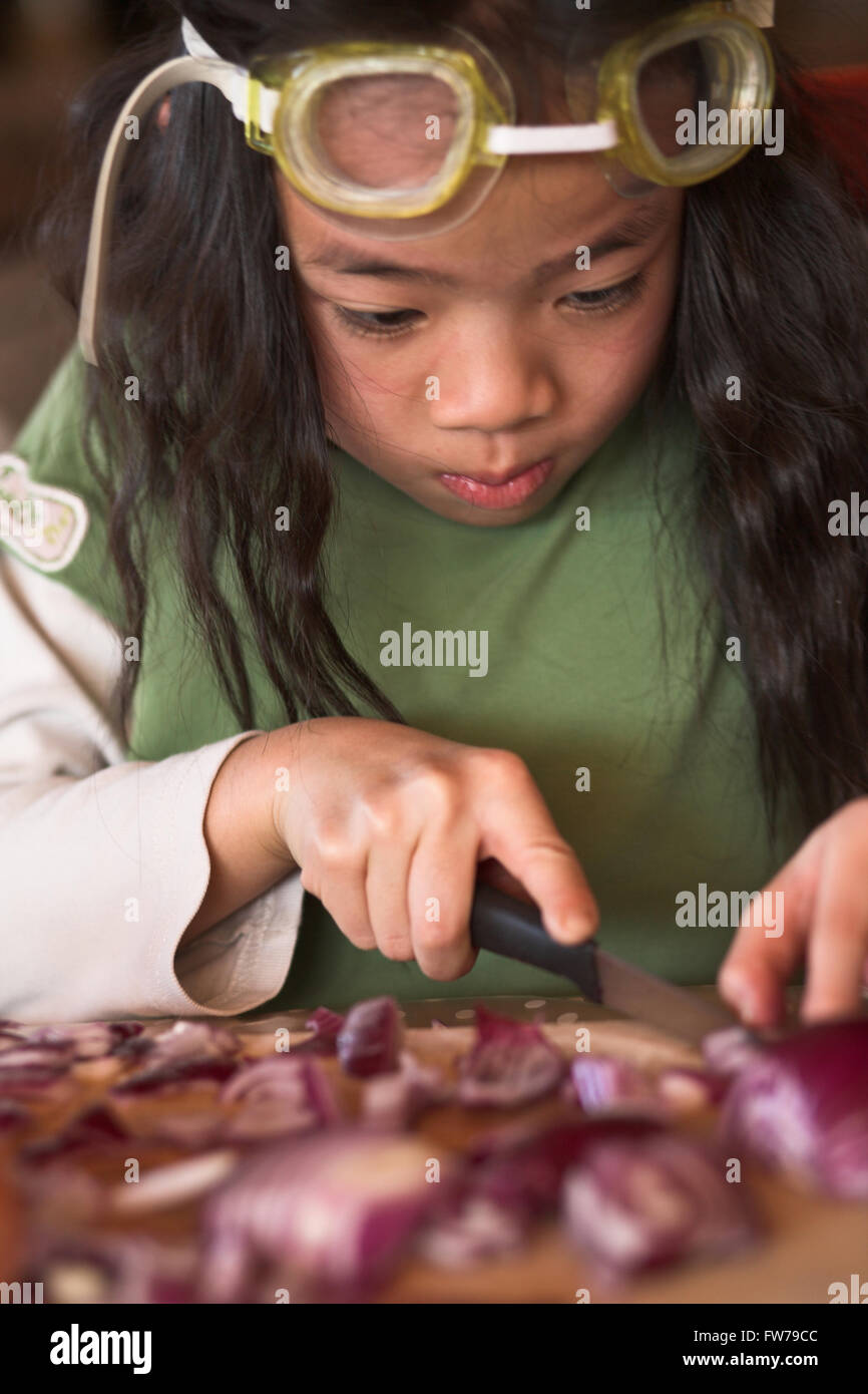 Onion peeling technique with diving glasses Stock Photo Alamy