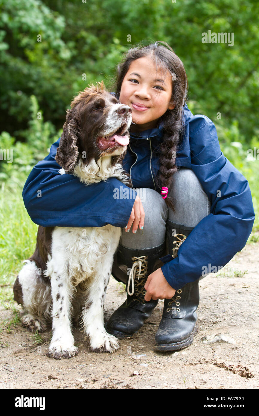 Girl with a dog in denmark in the summer Stock Photo Alamy