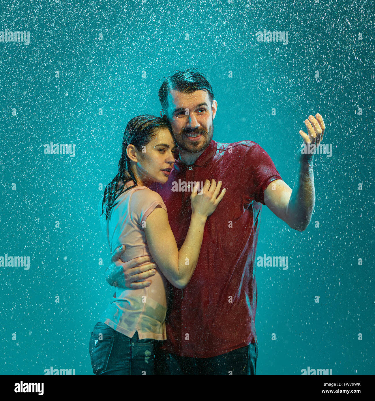 The loving couple in the rain Stock Photo - Alamy