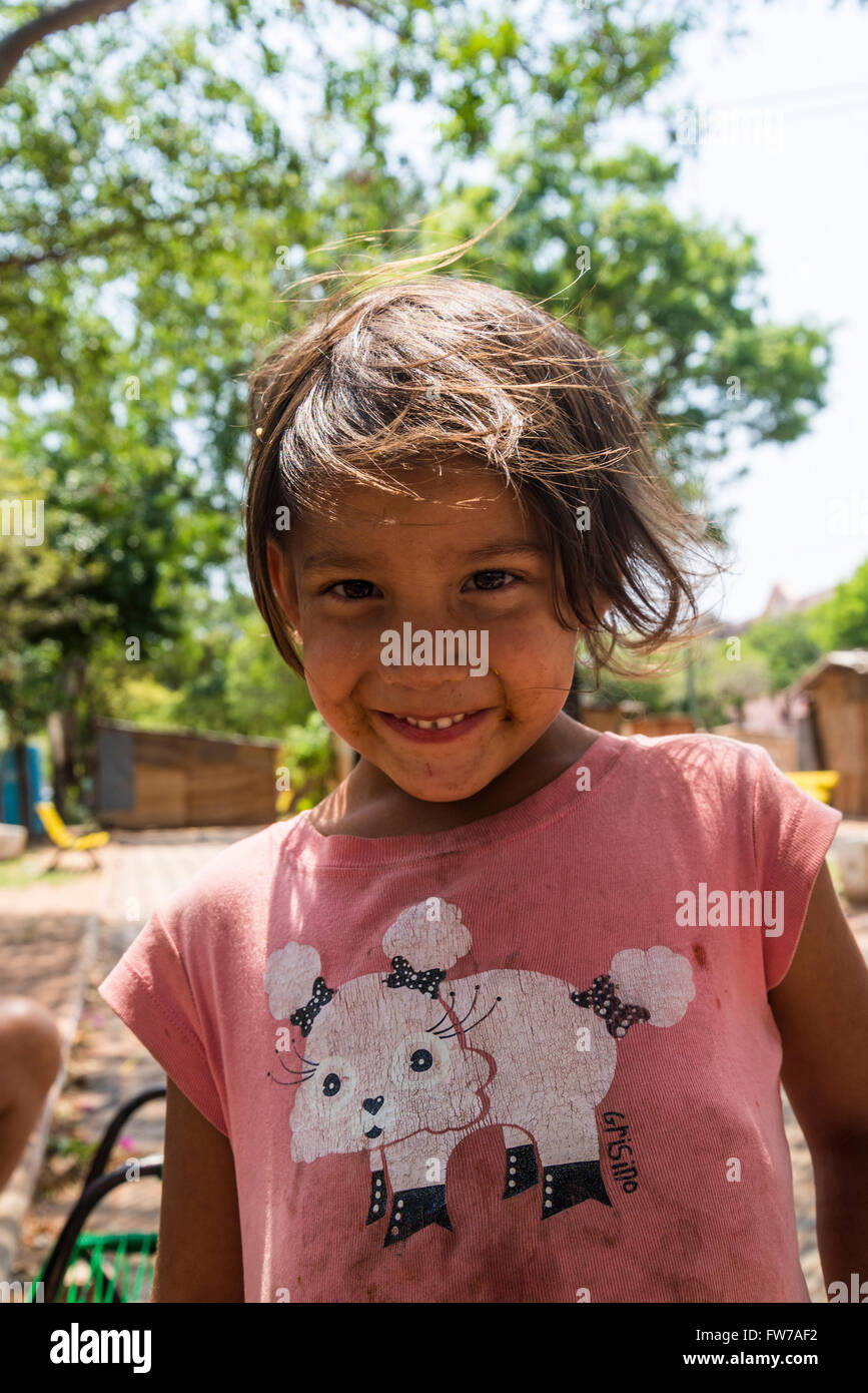 Guarani child in makeshift camp at Plaza de la Independencia, Asuncion, Paraguay Stock Photo