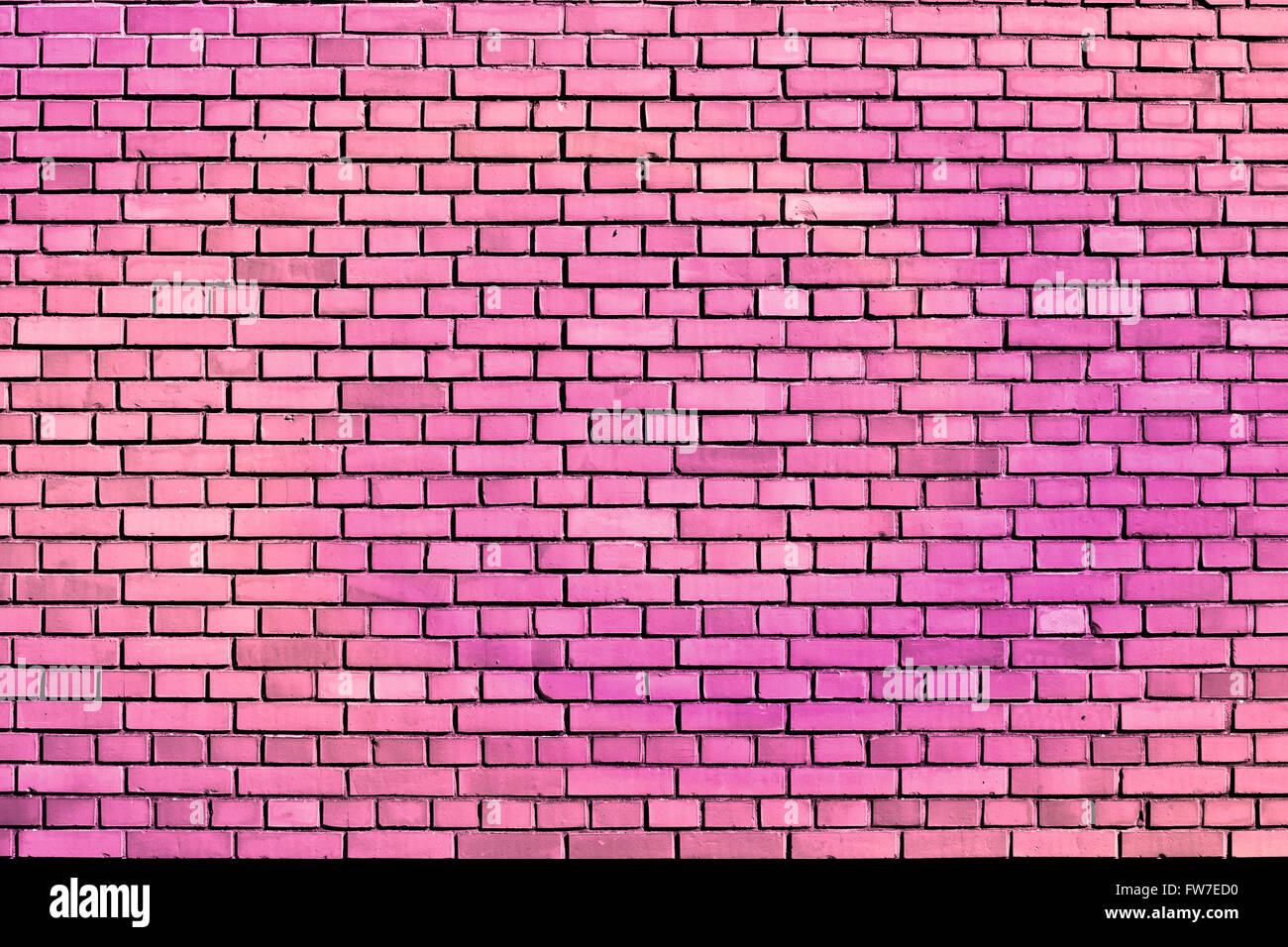 pink weathered brick wall background Stock Photo