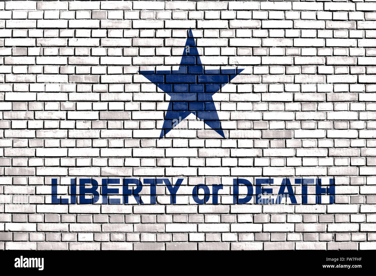 slogan Liberty or Death on a brick wall Stock Photo