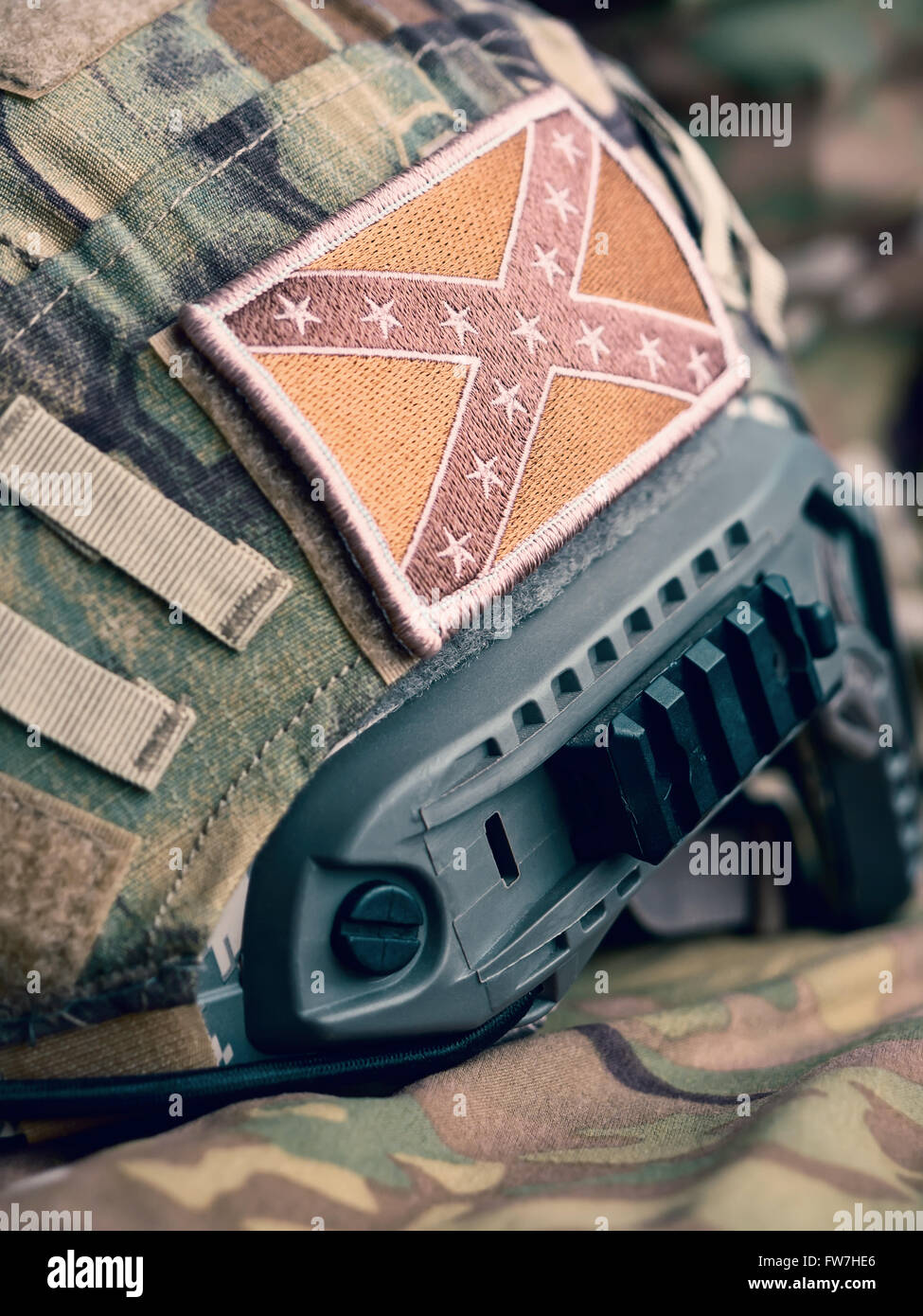 Confederate Flag patch on a modern combat helmet, shallow depth of field Stock Photo