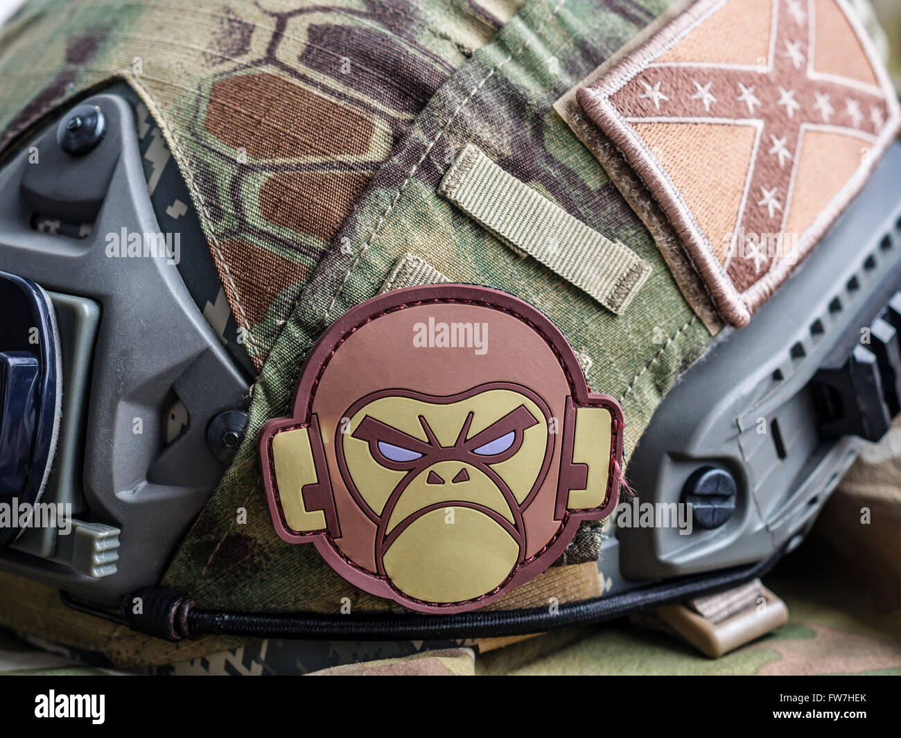 Los Angeles, CA, USA - March 17, 2016: Mil-Spec Monkey and confederate flag patches on a tactical battle helmet Stock Photo