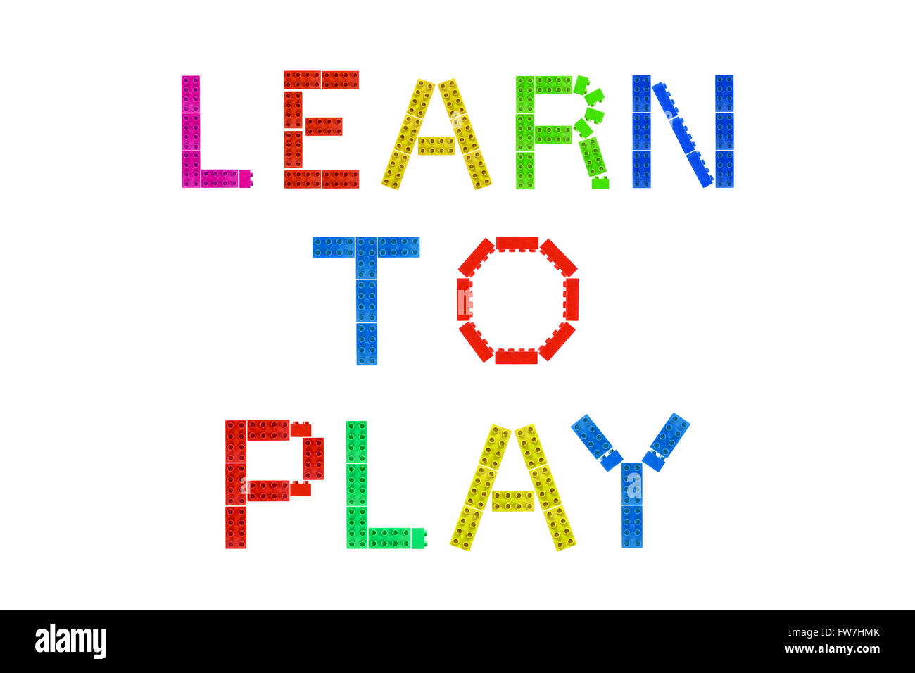 Learn to Play created from Lego pieces photographed against a white background. Stock Photo