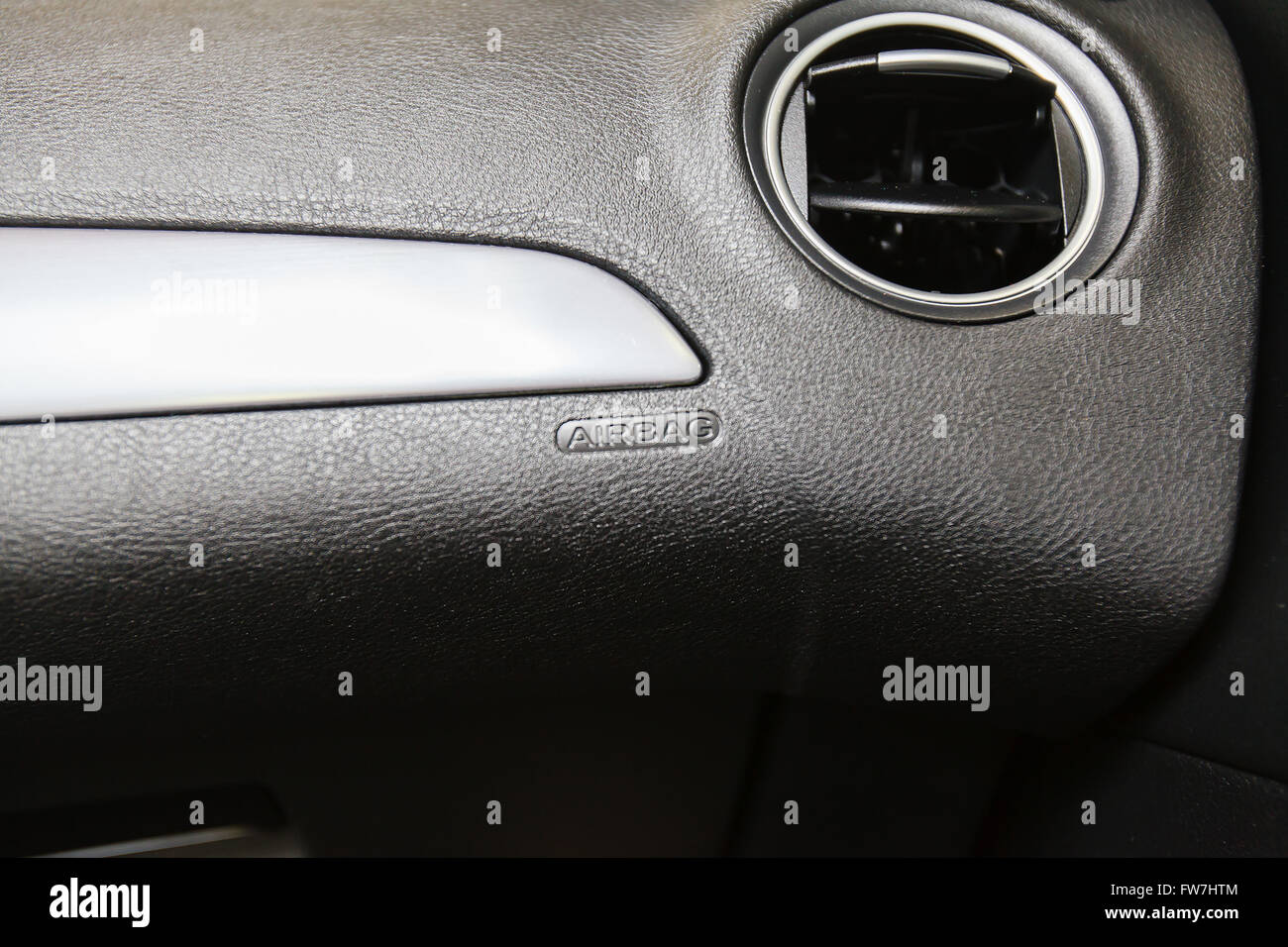 Marking the location of the airbag on the dashboard of your car Stock