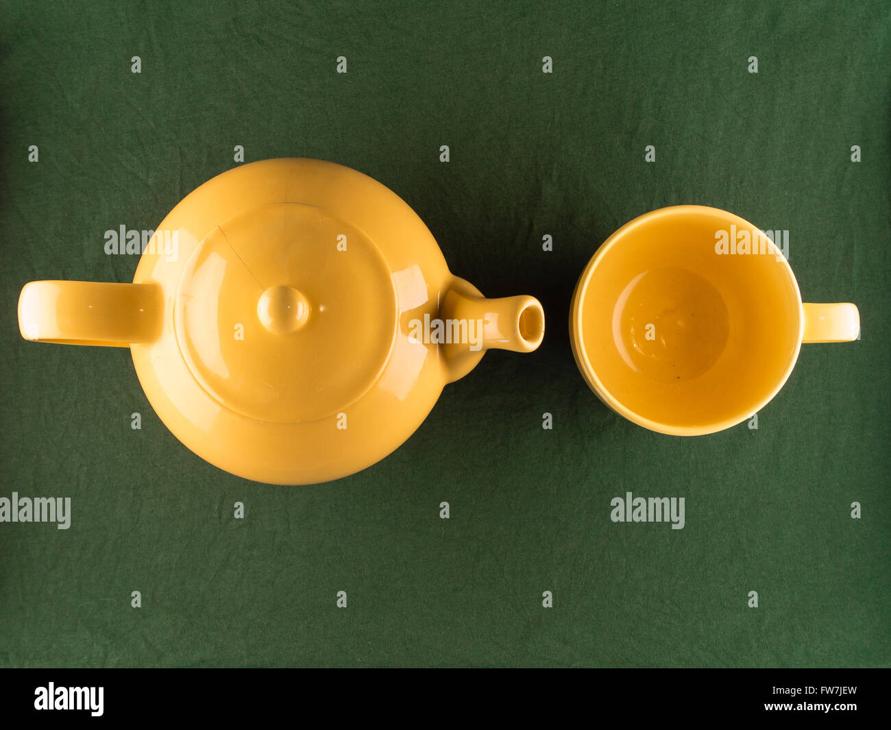 Download Yellow Teapot And Empty Mug Copy Space Top View Stock Photo Alamy Yellowimages Mockups