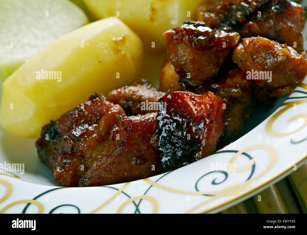 Filipino Braised Pork Adobo.pork cooked in soy sauce, vinegar, and