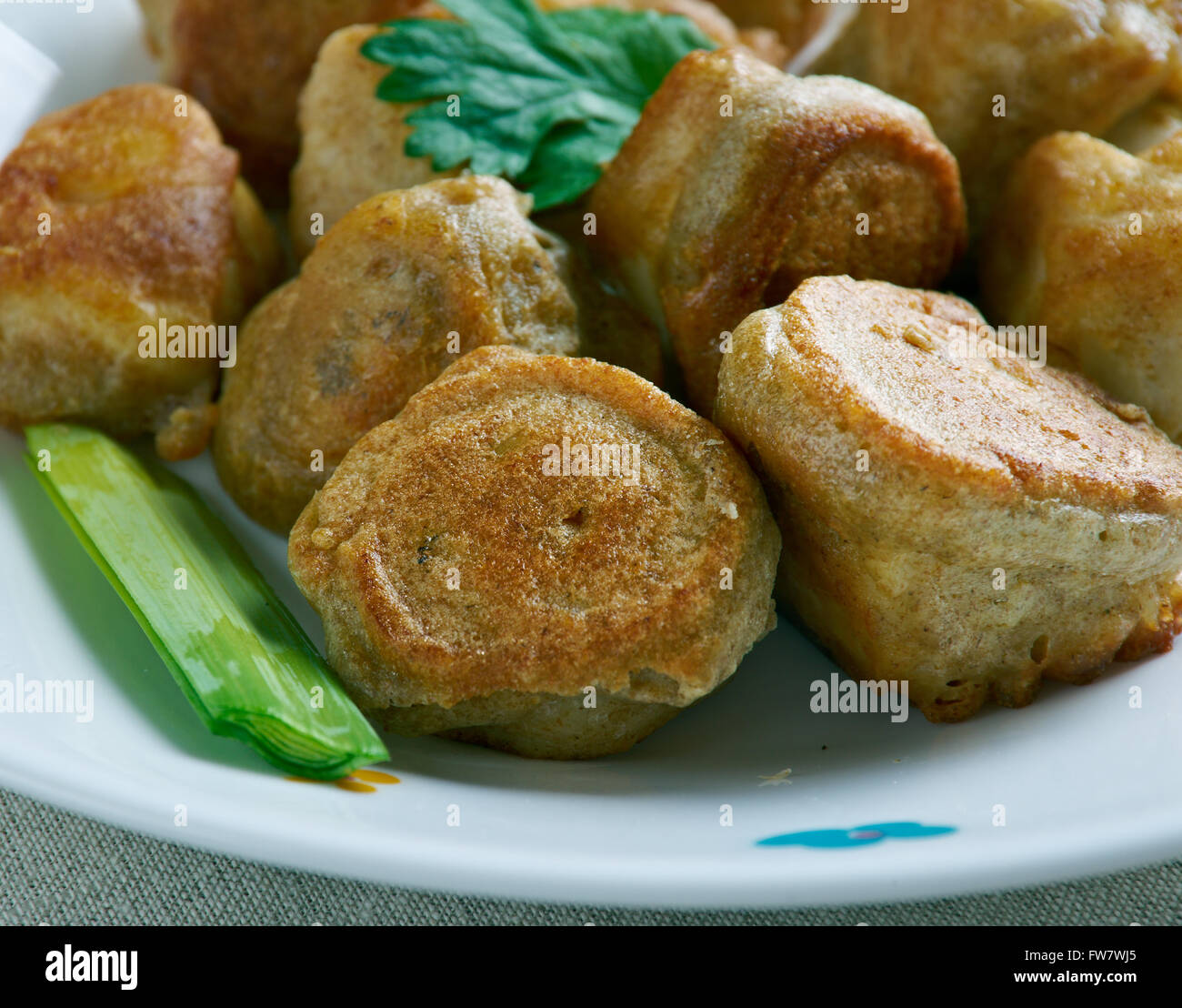 Stamp and Go - fish fritter made with salt fish in Jamaican cuisine Stock Photo