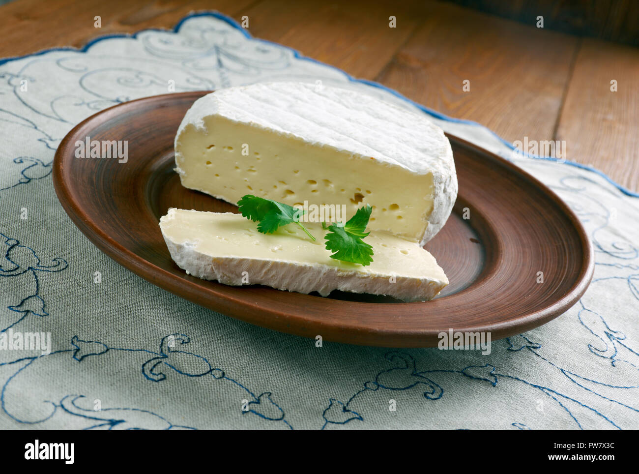 Round Brie cheese soft cow's milk cheese named after Brie, the French region Stock Photo Alamy