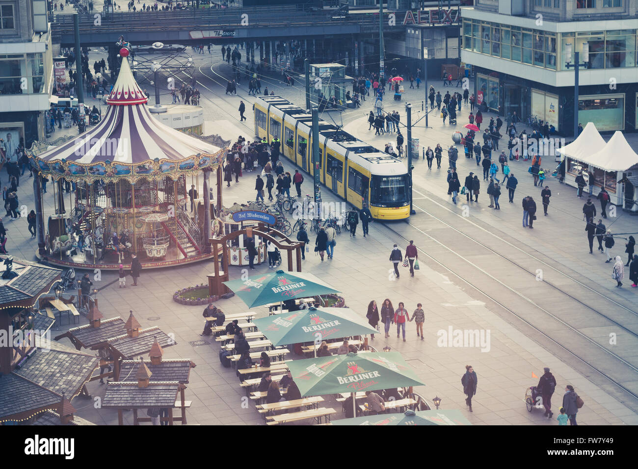 Berlin, Germany - march 30, 2016: People and trains at Alexanderplatz in berlin, germany from high viewpoint. Stock Photo