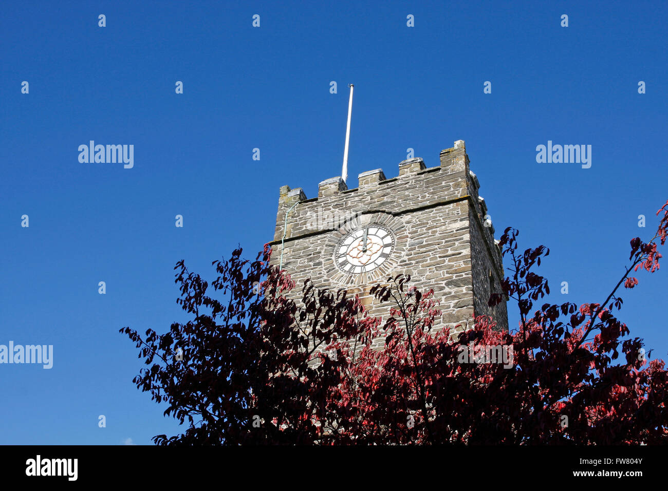 Church clock tower showing twelve o clock, noon Stock Photo Alamy