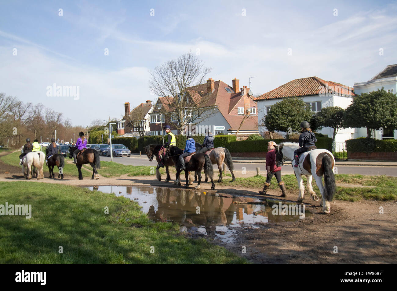 Wimbledon London, UK. 1st April 2016. UK Weather: A group of horse riders form a riding school enjoy the spring sunshine on Wimbledon Common as temperatures are forecast to rise Credit:  amer ghazzal/Alamy Live News Stock Photo