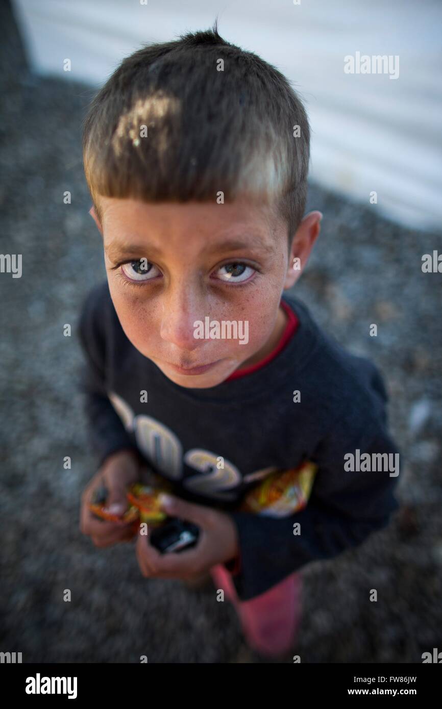 Refugee child in a refugee camp in Northern Iraq Stock Photo