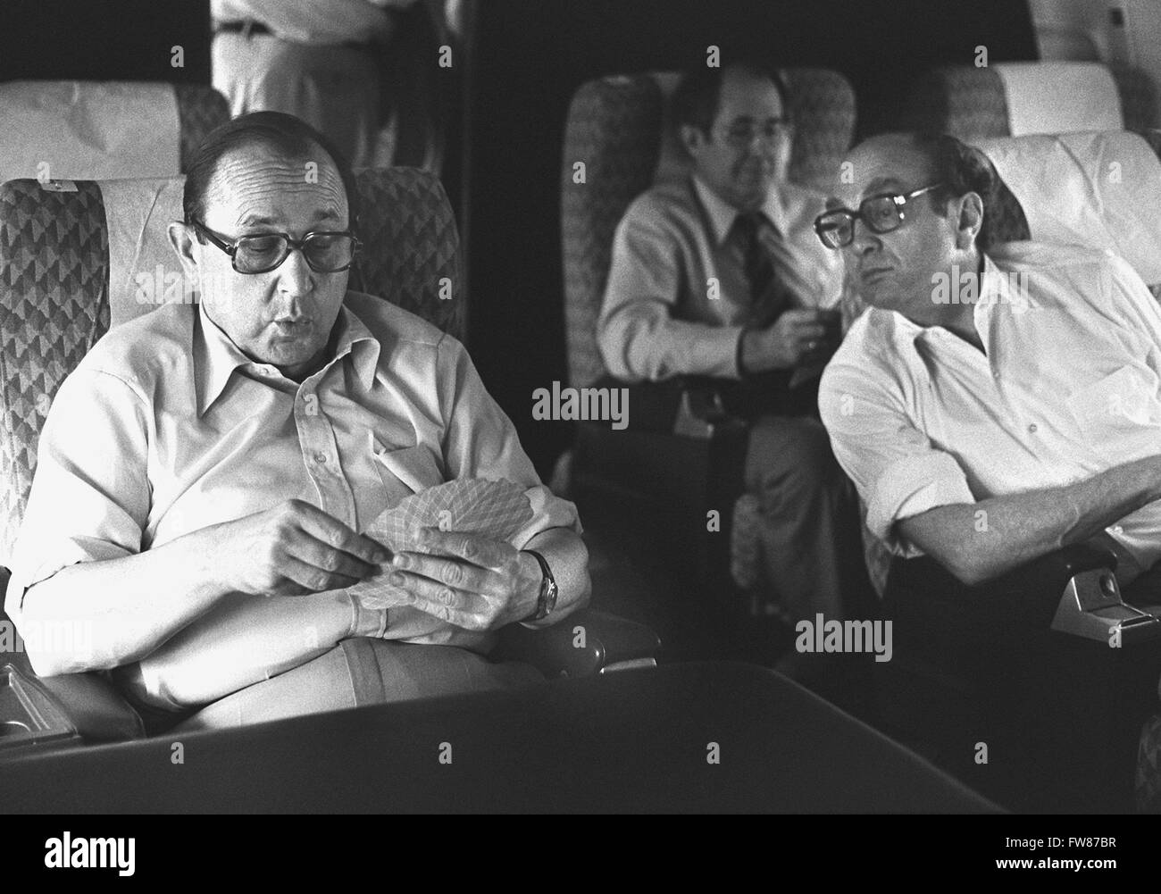 German foreign minister Hans-Dietrich Genscher and minister of economy Otto Graf Lambsdorff (both FDP) play cards during their flight to Tokyo on 26 June 1979. Stock Photo