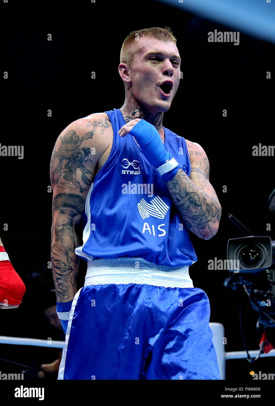 Qian'an, China's Hebei Province. 1st Apr, 2016. Daniel Jason Lewis of Australia celebrates during the bronze medal match against Shinebayar Narmandakh of Mongolia in the men's 75kg category competition at the Asia/Oceania Zone boxing event qualifier for 2016 Rio Olympic Games in Qian'an, north China's Hebei Province, April 1, 2016. Lewis won 3-0. Credit:  Yang Shiyao/Xinhua/Alamy Live News Stock Photo