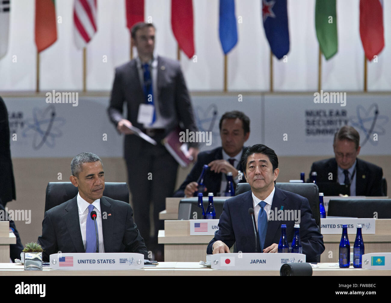 April 1, 2016 - Washington, District of Columbia, United States of America - United States President Barack Obama, left, and Shinzo Abe, Japan's prime minister, wait to begin an opening plenary entitled ''National Actions to Enhance Nuclear Security'' at the Nuclear Security Summit in Washington, DC, U.S., on Friday, April 1, 2016. After a spate of terrorist attacks from Europe to Africa, Obama is rallying international support during the summit for an effort to keep Islamic State and similar groups from obtaining nuclear material and other weapons of mass destruction. Credit: Andrew Harrer Stock Photo