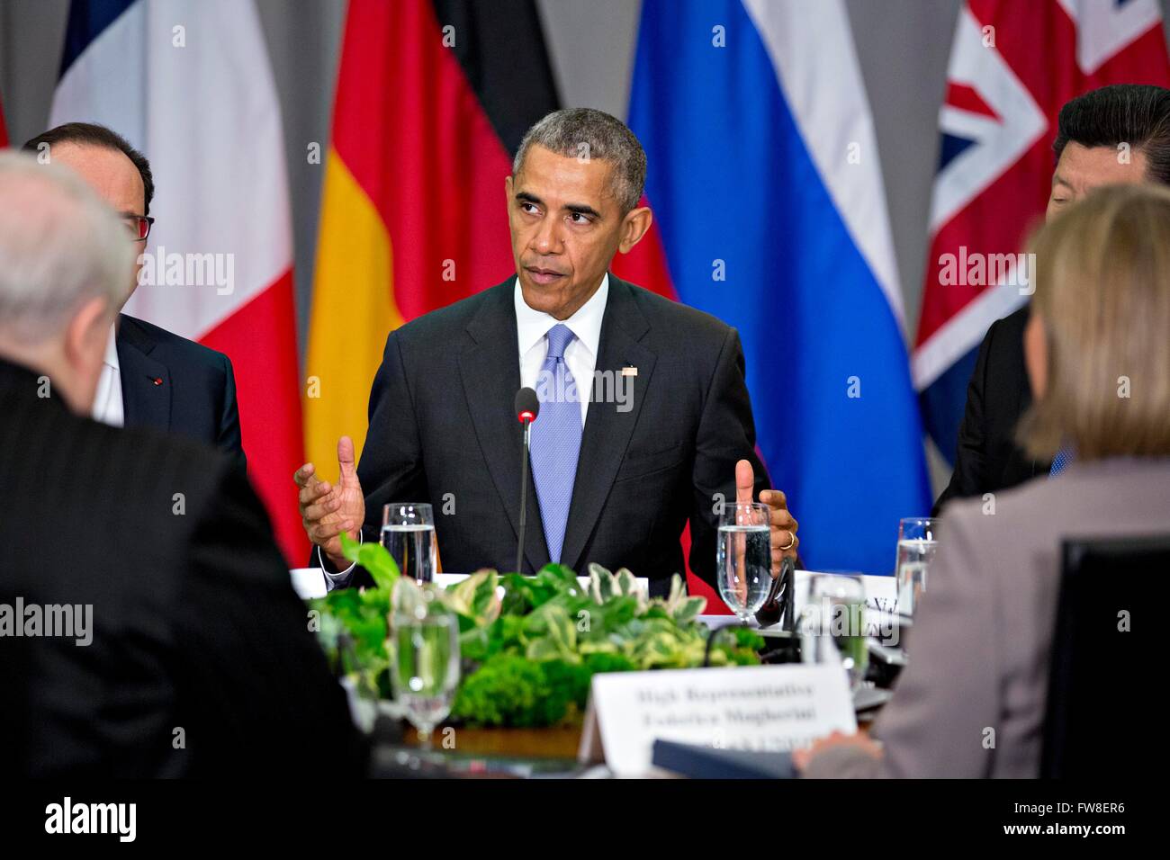 United States President Barack Obama, center, speaks as Xi Jinping, China's president, right, and Francois Hollande, France's president, left, listen during a P5 1 multilateral meeting at the Nuclear Security Summit in Washington, DC, U.S., on Friday, April 1, 2016. After a spate of terrorist attacks from Europe to Africa, Obama is rallying international support during the summit for an effort to keep Islamic State and similar groups from obtaining nuclear material and other weapons of mass destruction. Credit: Andrew Harrer/Pool via CNP - NO WIRE SERVICE - Stock Photo