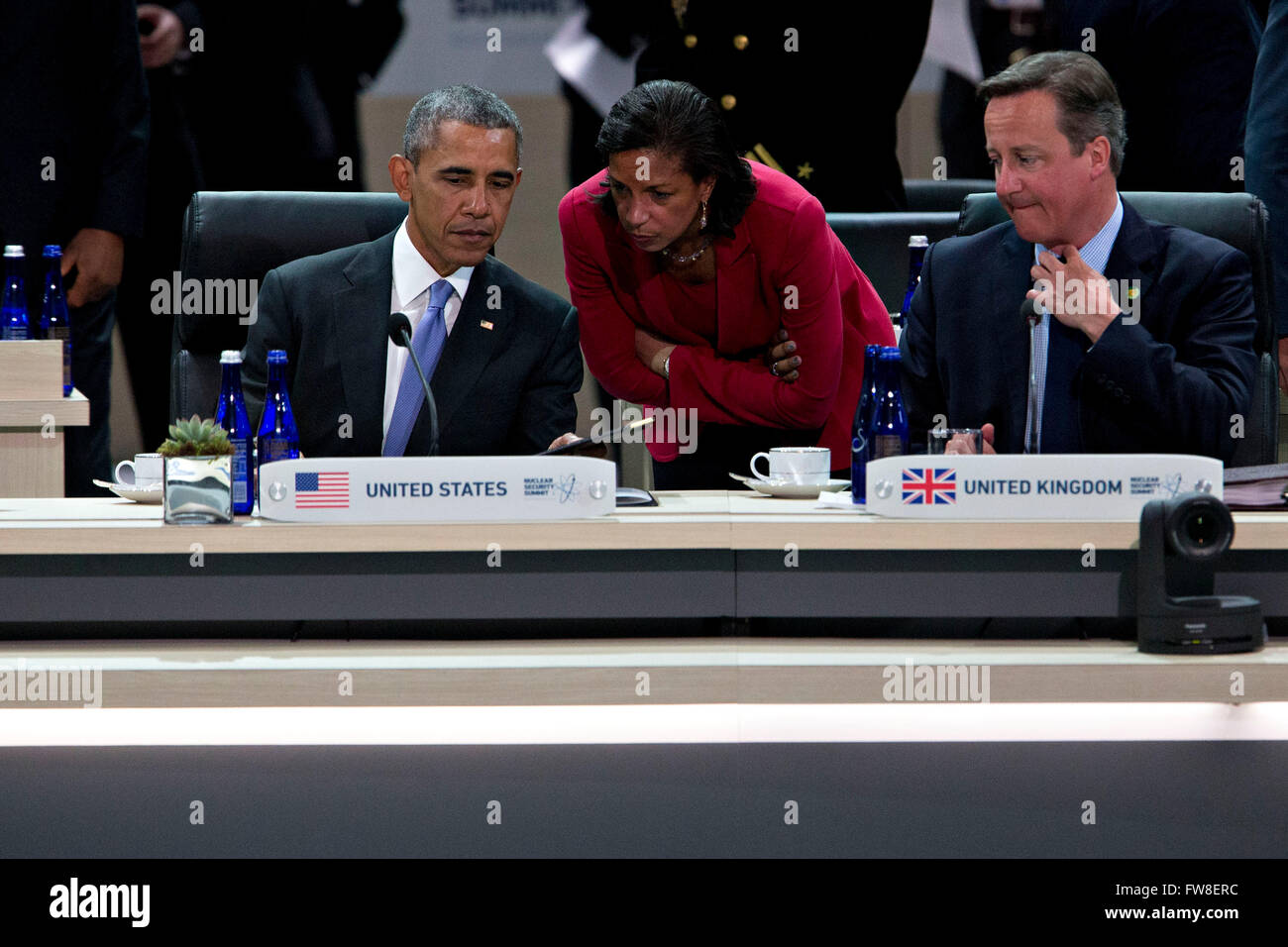 United States President Barack Obama, left, talks to Susan Rice, U.S. national security advisor, center, during a closing session with David Cameron, U.K. prime minister, right, at the Nuclear Security Summit in Washington, DC, U.S., on Friday, April 1, 2016. After a spate of terrorist attacks from Europe to Africa, Obama is rallying international support during the summit for an effort to keep Islamic State and similar groups from obtaining nuclear material and other weapons of mass destruction. Credit: Andrew Harrer/Pool via CNP - NO WIRE SERVICE - Stock Photo