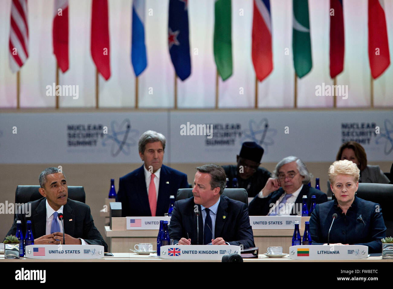 United States President Barack Obama, left, speaks during a closing session with David Cameron, U.K. prime minister, center, and Dalia Grybauskaite, Lithuania's president, at the Nuclear Security Summit in Washington, DC, U.S., on Friday, April 1, 2016. After a spate of terrorist attacks from Europe to Africa, Obama is rallying international support during the summit for an effort to keep Islamic State and similar groups from obtaining nuclear material and other weapons of mass destruction. Seated behind them are US Secretary of State John Kerry and US Secretary of Energy Ernest Moniz. Credi Stock Photo