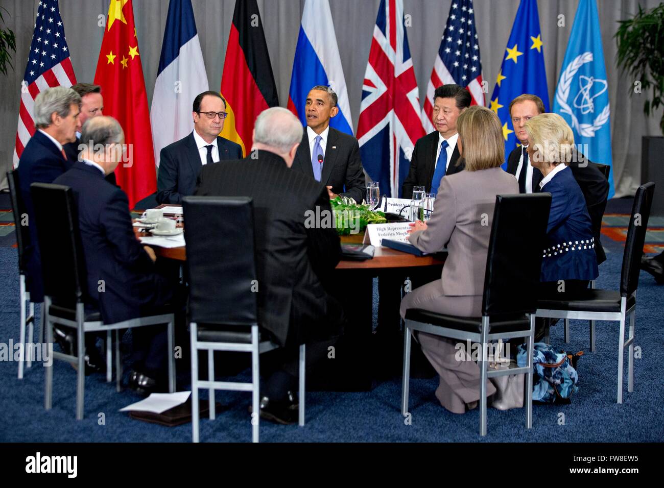 United States President Barack Obama, center, speaks as Xi Jinping, China's president, right, and Francois Hollande, France's president, left, listen during a P5 1 multilateral meeting at the Nuclear Security Summit in Washington, DC, U.S., on Friday, April 1, 2016. After a spate of terrorist attacks from Europe to Africa, Obama is rallying international support during the summit for an effort to keep Islamic State and similar groups from obtaining nuclear material and other weapons of mass destruction. Credit: Andrew Harrer/Pool via CNP - NO WIRE SERVICE - Stock Photo