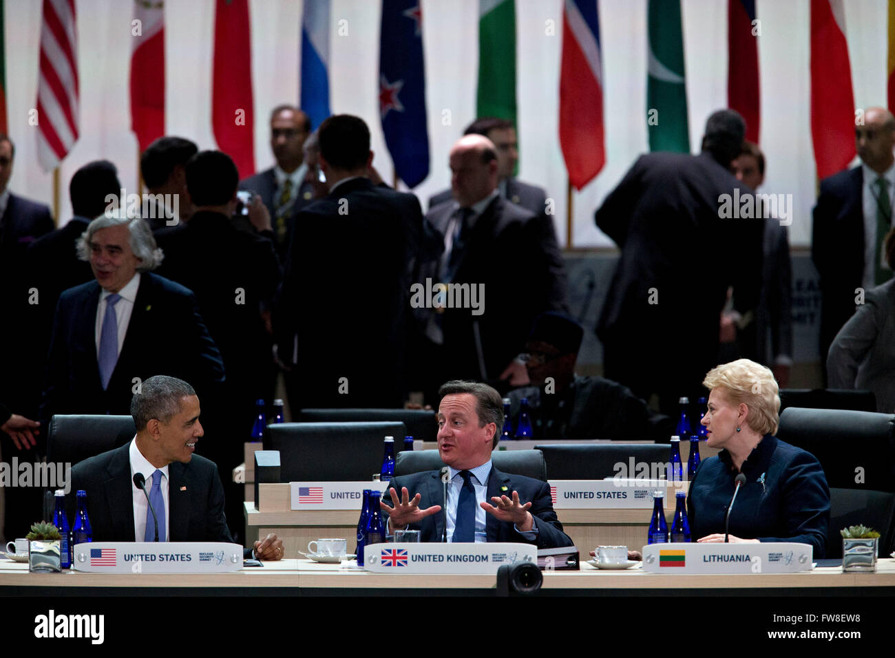 David Cameron, U.K. prime minister, center, talks to United States President Barack Obama, left, and Dalia Grybauskaite, Lithuania's president, during a closing session at the Nuclear Security Summit in Washington, DC, U.S., on Friday, April 1, 2016. After a spate of terrorist attacks from Europe to Africa, Obama is rallying international support during the summit for an effort to keep Islamic State and similar groups from obtaining nuclear material and other weapons of mass destruction. Credit: Andrew Harrer/Pool via CNP - NO WIRE SERVICE - Stock Photo