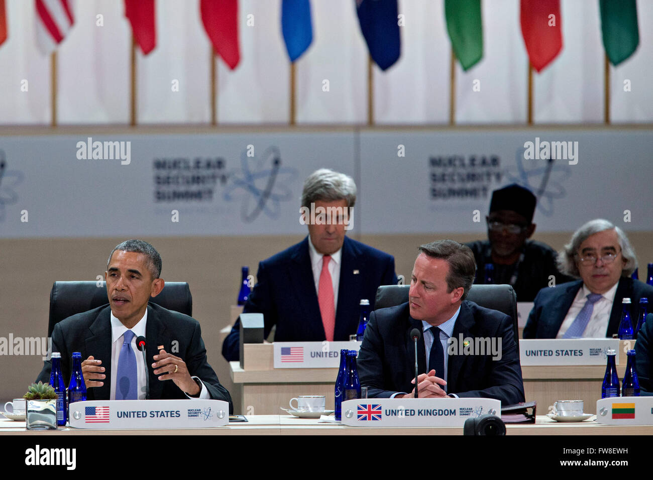 United States President Barack Obama, left, speaks during a closing session with David Cameron, U.K. prime minister, at the Nuclear Security Summit in Washington, DC, U.S., on Friday, April 1, 2016. After a spate of terrorist attacks from Europe to Africa, Obama is rallying international support during the summit for an effort to keep Islamic State and similar groups from obtaining nuclear material and other weapons of mass destruction. Seated behind them are US Secretary of State John Kerry and US Secretary of Energy Ernest Moniz. Credit: Andrew Harrer/Pool via CNP - NO WIRE SERVICE - Stock Photo