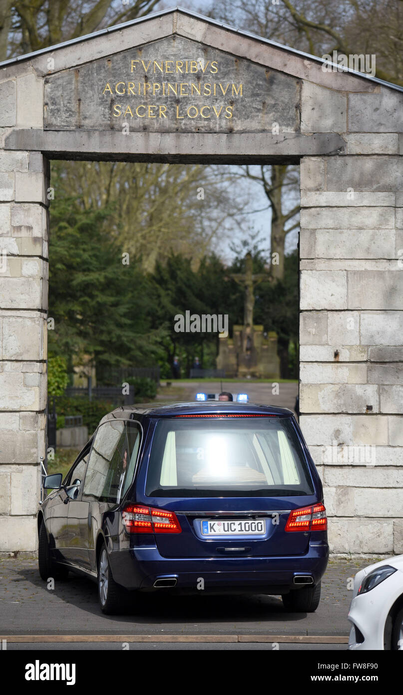 Cologne, Germany. 02nd Apr, 2016. The hearse arrives to the Melaten cemetery for the funeral of former Minister of Foreign Affairs Guido Westerwelle in Cologne, Germany, 02 April 2016. Westerwelle died in the University Hosptial Cologne on 18 March 2016 at the age of 54 as a result of leukemia. Photo: HENNING KAISER/dpa/Alamy Live News Stock Photo