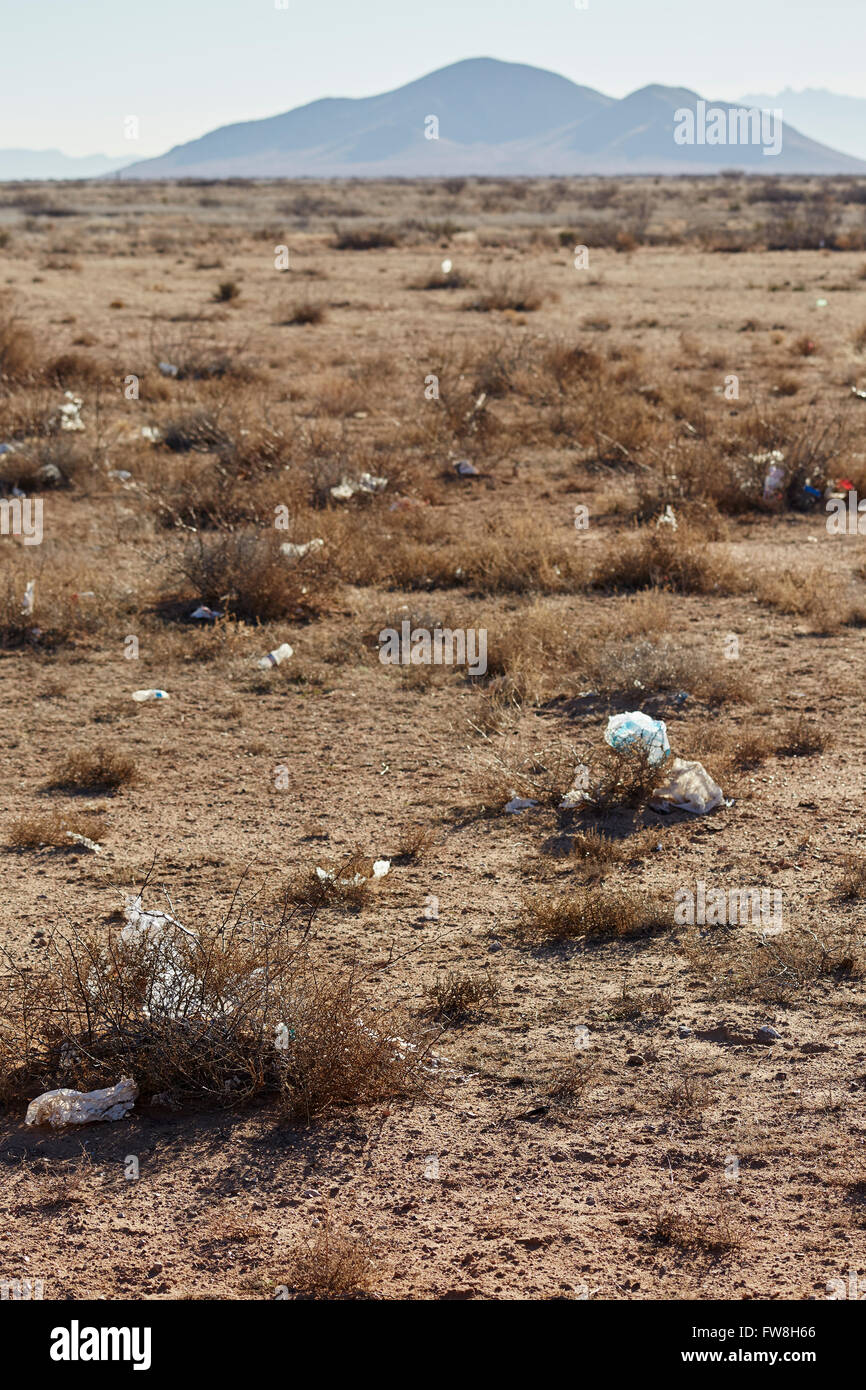 rubbish, garbage, trash strewn range land, near Deming, New Mexico, USA Stock Photo