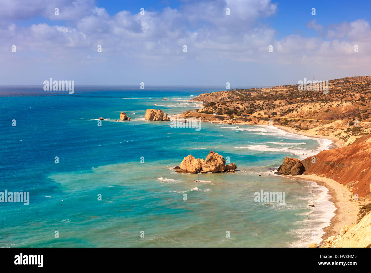 Seascape with Petra tou Romiou, also known as Aphrodite's Rock, is a sea stack in Paphos, Cyprus. Stock Photo