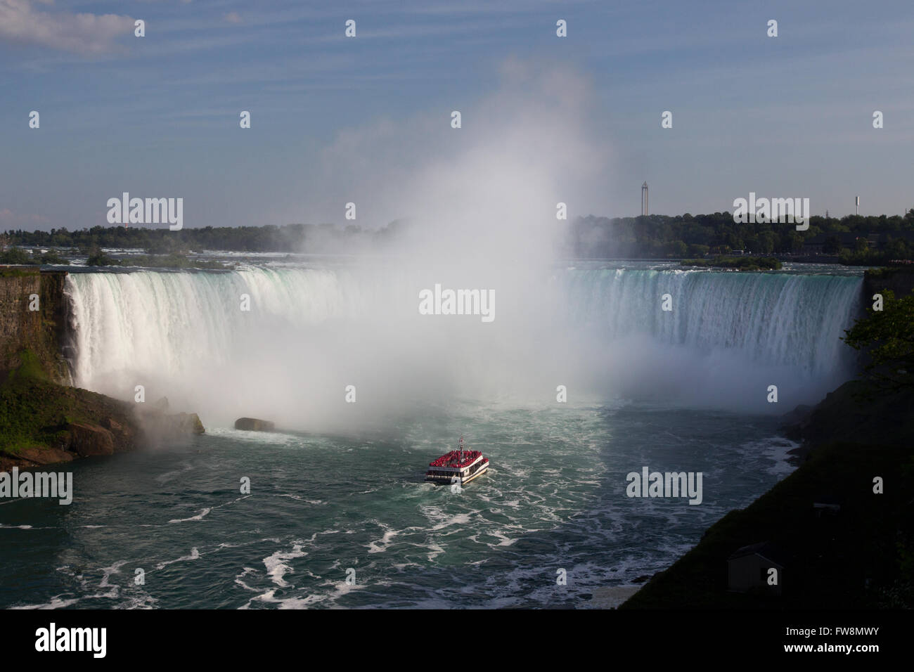 The Canadian tour boat Horn blower drives near the Canadian horseshoe falls in Niagara Falls Ont
